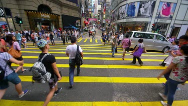 Pedestrians Crossing Queens Road At D'Aguilar Street, Central, Hong Kong, Asia