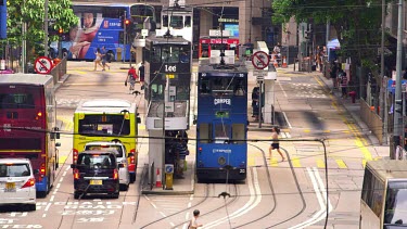 Trams, Buses & Pedestrians On Des Voeux Road, Central, Hong Kong