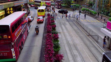 Buses, Trams & Pedestrians On Yee Wo Street, Causeway Bay, Hong Kong, China