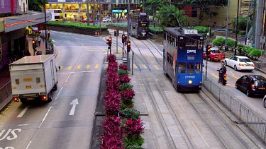 Buses, Trams & Pedestrians On Yee Wo Street, Causeway Bay, Hong Kong, China