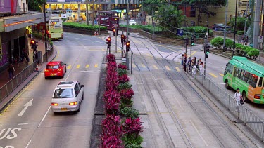 Buses, Trams & Pedestrians On Yee Wo Street, Causeway Bay, Hong Kong, China