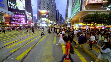 Pedestrians Crossing At Hennessy Road & Yee Wo Street, Causeway Bay, Hong Kong, China