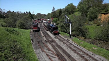 Black Steam Train Leaves Railway Station, Goathland, North Yorkshire, England