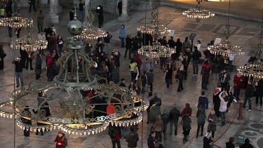 Chandeliers & Tourists In Haghia Sophia, Sultanahmet, Istanbul, Turkey