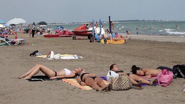 Sunbathing On Beach, Lido, Venice, Italy