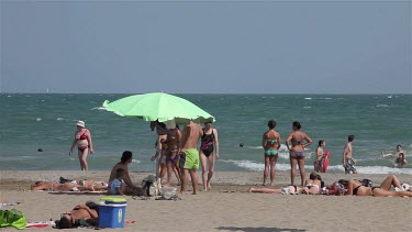 Tourists On Adriatic Beach, Lido, Venice, Italy