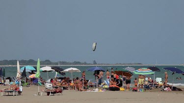 Tourists & Parasols On Beach, Lido, Venice, Italy