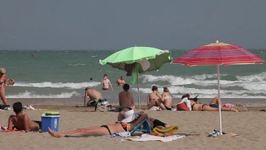 Tourists & Parasols On Beach, Lido, Venice, Italy