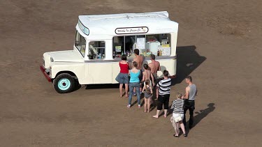 Ice Cream Queue On Beach, Whitby, North Yorkshire, England