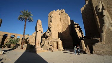 Toursit Group At Colossus Of Ramses Ii, Temple Of Amun, Karnak, Luxor, Egypt