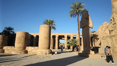 Toursit Group At Colossus Of Ramses Ii, Temple Of Amun, Karnak, Luxor, Egypt