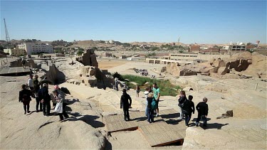 Tourists View The Unfinished Obelisk, Aswan, Egypt