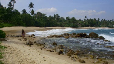 Woman Walks Along Indian Ocean Beach, Tangalle, Sri Lanka