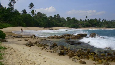 Woman Walks Along Indian Ocean Beach, Tangalle, Sri Lanka