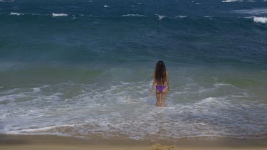 Woman In Surf On Indian Ocean Beach, Tangalle, Sri Lanka