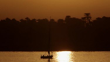Silhouette Felucca & Sunset, River Nile, Luxor, Egypt