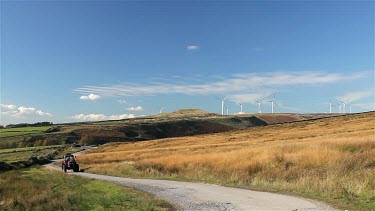 Red Tracker & Wind Turbines On Moor, Near, Wolstenholme, Lancashire