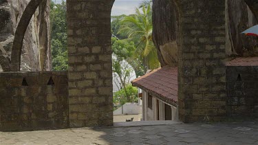 Woman Looks Through Arch, Aluvihara Rock Cave Temple, Matale, Sri Lanka