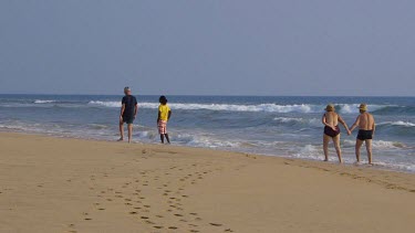 Old Couple Walk On Beach, Bentota, Sri Lanka