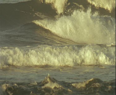 waves crashing on beach