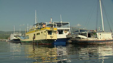 Boating by a busy harbour