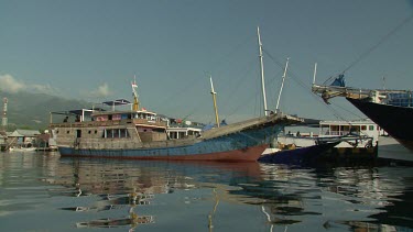 Boating by a busy harbour