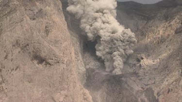 Komba volcano erupting