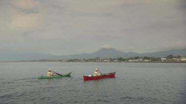 Maumere locals in canoes