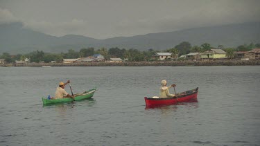 Maumere locals in canoes