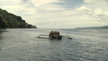 Large fish trap on a canoe
