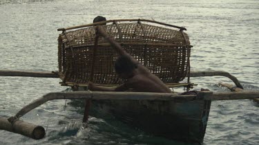 Large fish trap on a canoe