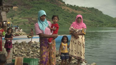 Bajau villagers on shore
