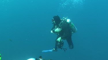 Scuba diver swimming underwater