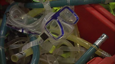 Bins holding goggles for scuba diving