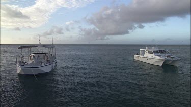 Pannign shot of motor boat parked near the shore