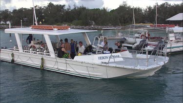 Heron Hussar boat leaving the pier