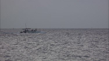 Heron Hussar boat moving on the ocean.