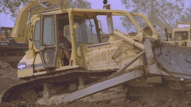 Excavating digger and Bulldozer
