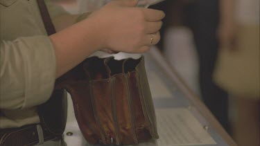 employee taking money from tourists for entry