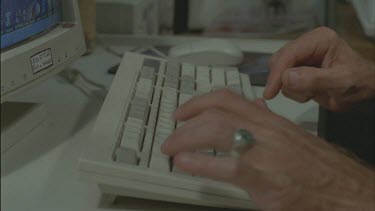 koala volunteer typing in result into computer