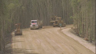 construction dumper driving past