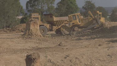 Excavating digger and Bulldozer