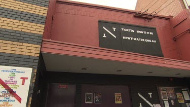Box office and sign for a city theatre