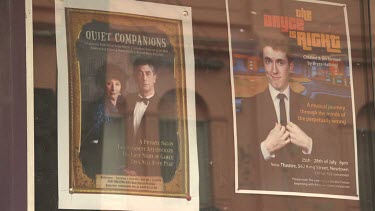 Posters for shows outside a theatre