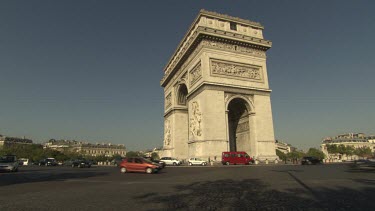 Traffic driving by l'Arc de Triomphe, Paris, France