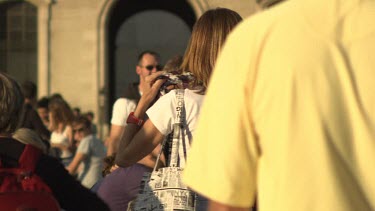 Visitors outside Notre Dame Cathedral, Paris, France