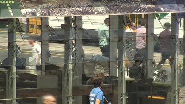 Pedestrians walking on a busy city street