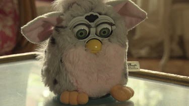 Pink and grey plush Furby toy