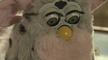 Pink and grey plush Furby toy