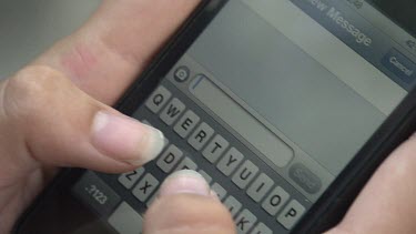 Close up of a person texting on a smartphone